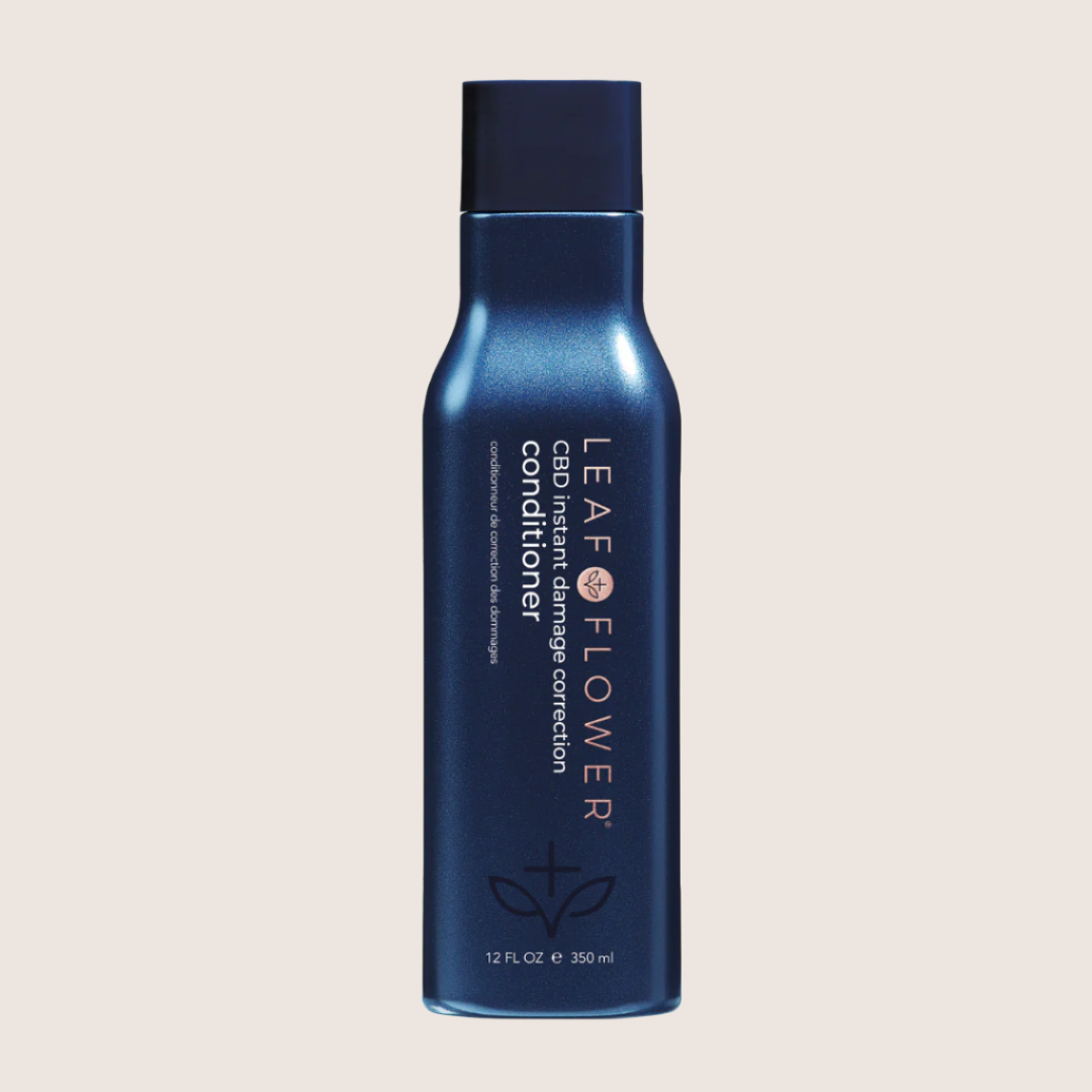 The Leaf and Flower Damage Correction Conditioner features a color-safe, plant-based formula in various sizes, including a blue 12 fl oz bottle, to keep your hair vibrant and healthy.