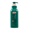 A bottle of green Leaf and Flower haircare shampoo.