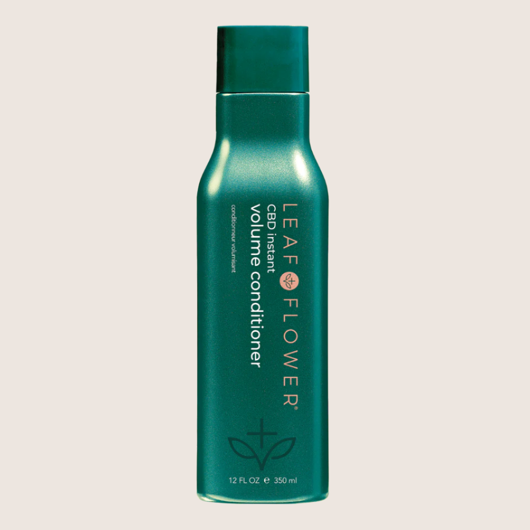 Green bottle of LEAF and FLOWER Instant Volume Conditioner for fine curly hair, 12 fl oz (350 ml).