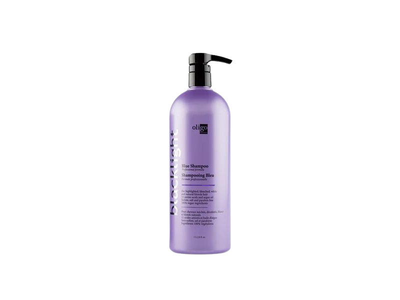 A bottle of Oligo Blacklight Blue Shampoo for brassiness elimination on a black background.