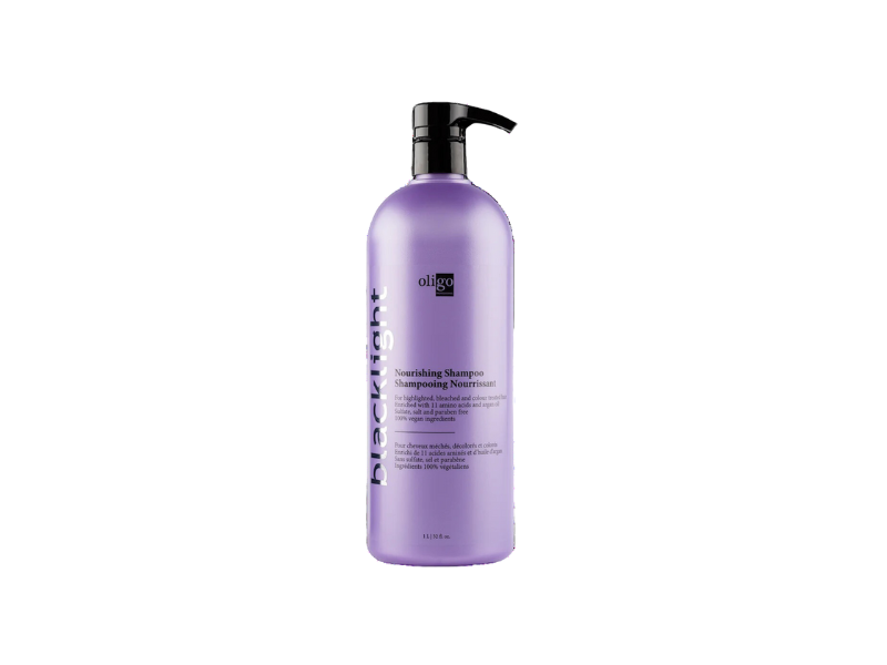 A bottle of Oligo Blacklight Nourishing Shampoo for color-treated hair.