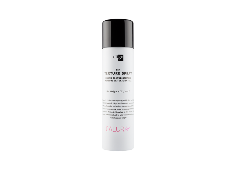 A bottle of Oligo Calura Dry Texture Spray for added flexibility and texture.