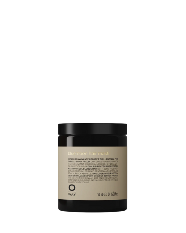 A black jar of Oway Bluemoon Hair Mask for cool blonde hair, 150 ml, sits on a white background. This color-enhancing mask restores softness and shine while neutralizing brassiness for vibrant, healthy-looking blondes.