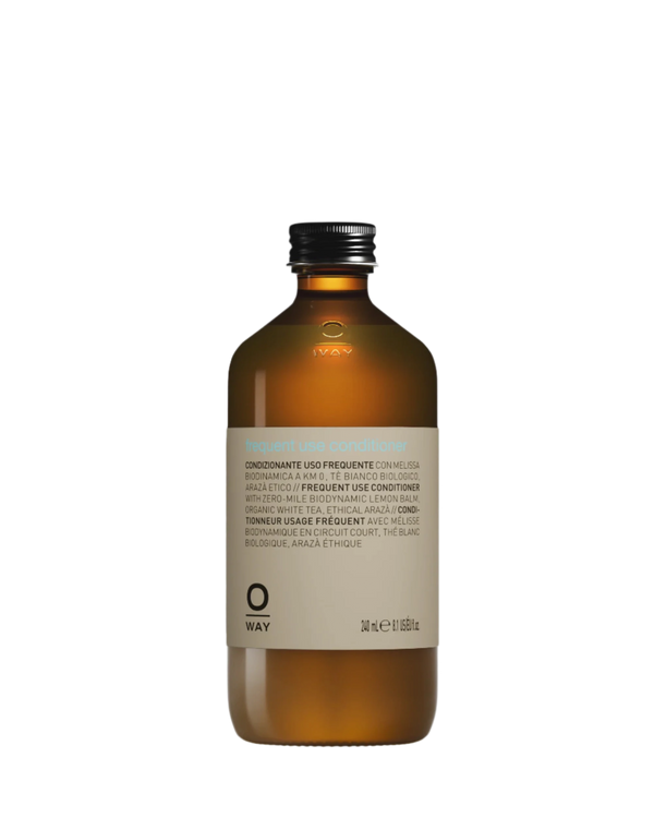Oway Frequent Use Conditioner is a lightweight, everyday formula for all hair types, packaged in a brown semi-transparent bottle with a silver screw cap and contains 240 ml (8.1 fl oz).