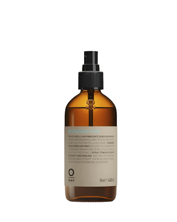 Amber-colored spray bottle with black nozzle, filled with Oway Phytoprotein Mist, a clear leave-in treatment for strengthening fragile hair and preventing breakage. The light label shows text in multiple languages and the "O" logo at the bottom.