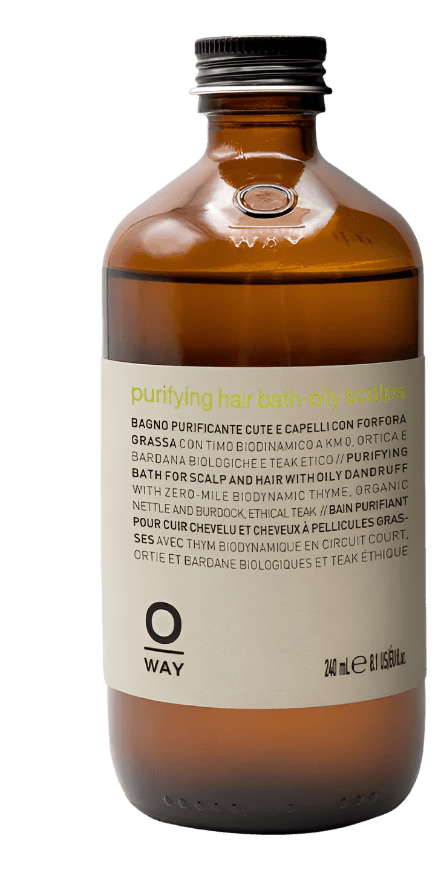 A 240 ml brown glass bottle of Oway Purifying Hair Bath for Oily Scalp, featuring multilingual front labeling. An organic shampoo by Oway, ideal for gently clarifying and balancing oily scalps.
