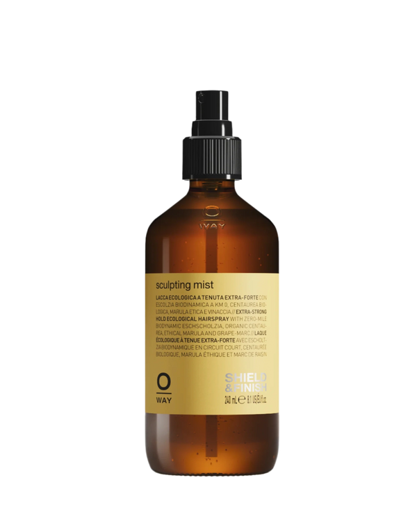 A brown spray bottle with a black nozzle labeled "Oway Sculpting Mist | Long-Lasting Finishing Spray with Flexible Hold" features branding and product details from Oway on its yellow label.
