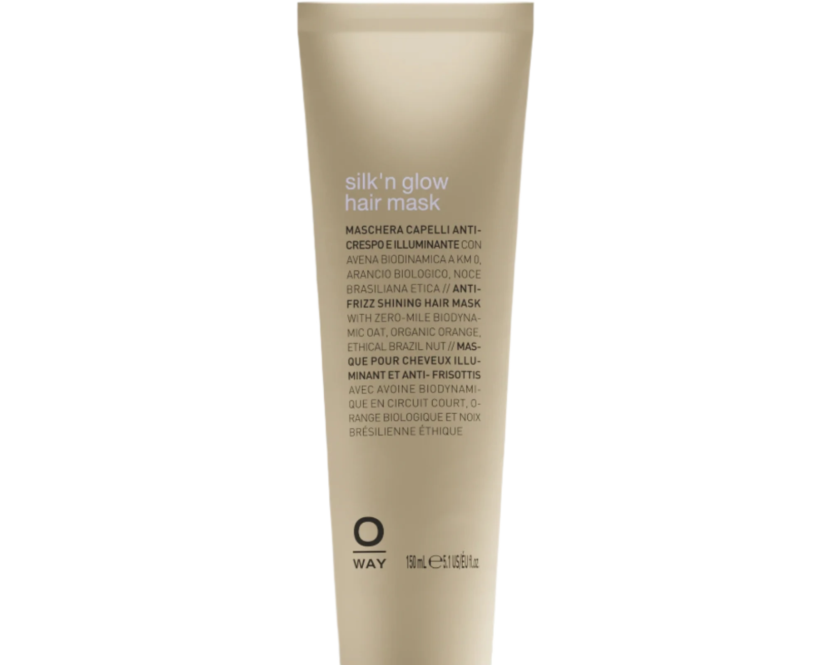 A beige tube of Oway Silk’N Glow Hair Mask for dry, frizzy hair with a black cap is displayed against a dark textured background. The label features product details in various languages.
