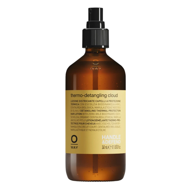 The Oway Thermo-Detangling Cloud is a heat-protective detangler for all hair types. Housed in a 240 ml brown glass bottle with a black spray nozzle, it offers thermal defense and features detailed product labeling.