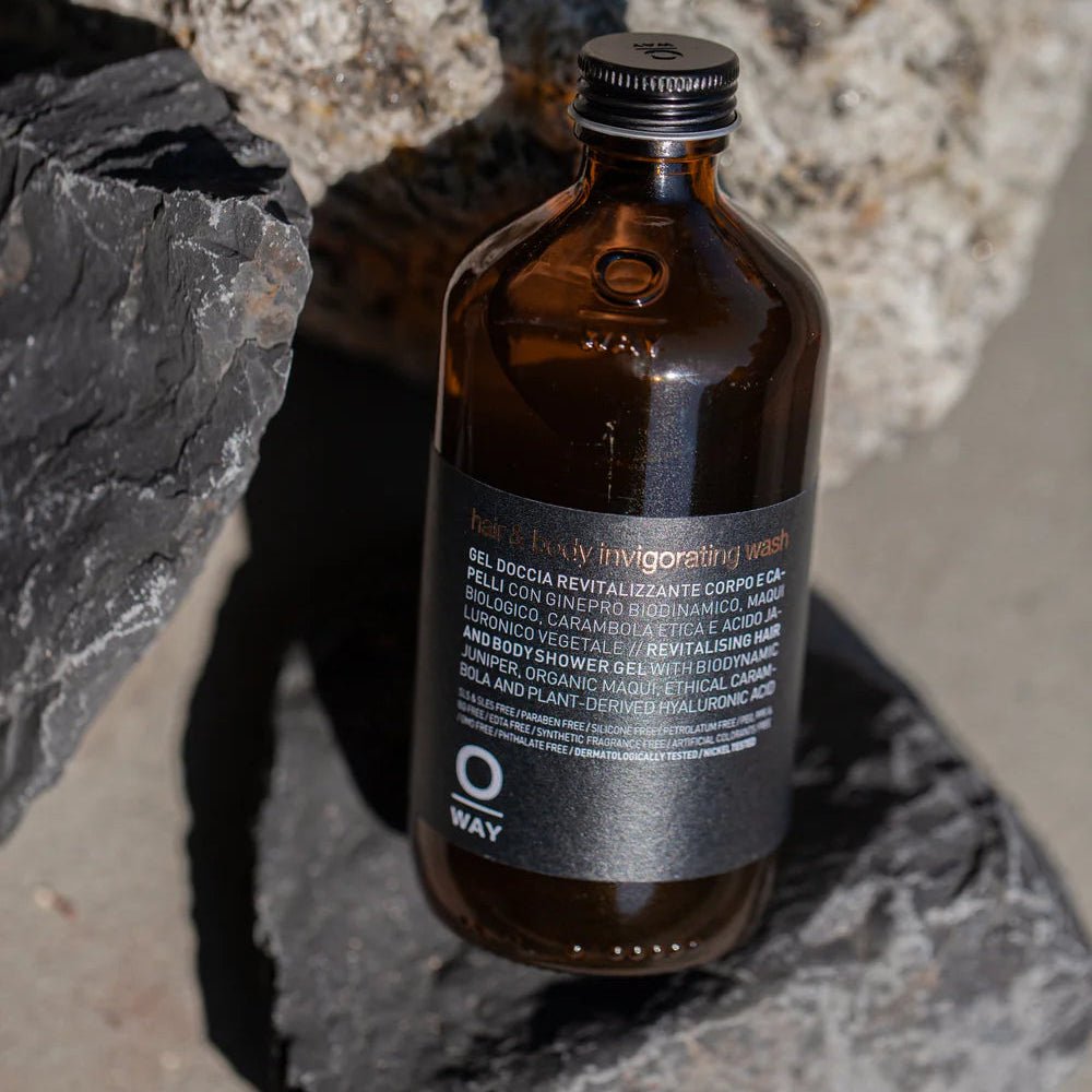 Brown bottle with a label on a stone surface