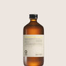 Brown bottle with a label on a white background