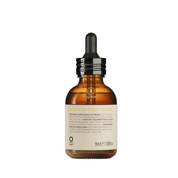 Brown glass bottle with dropper on a white background