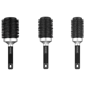The RUSK Round Brush by RUSK features black ionic bristles, a ceramic barrel, and a black handle with a hanging hole. Available in three sizes.