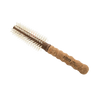 Round brush with cork handle on a white background