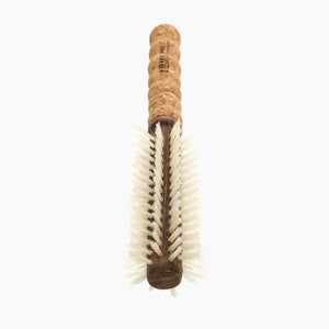 Hairbrush with cork handle on a white background
