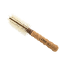 Round brush with cork handle on a white background