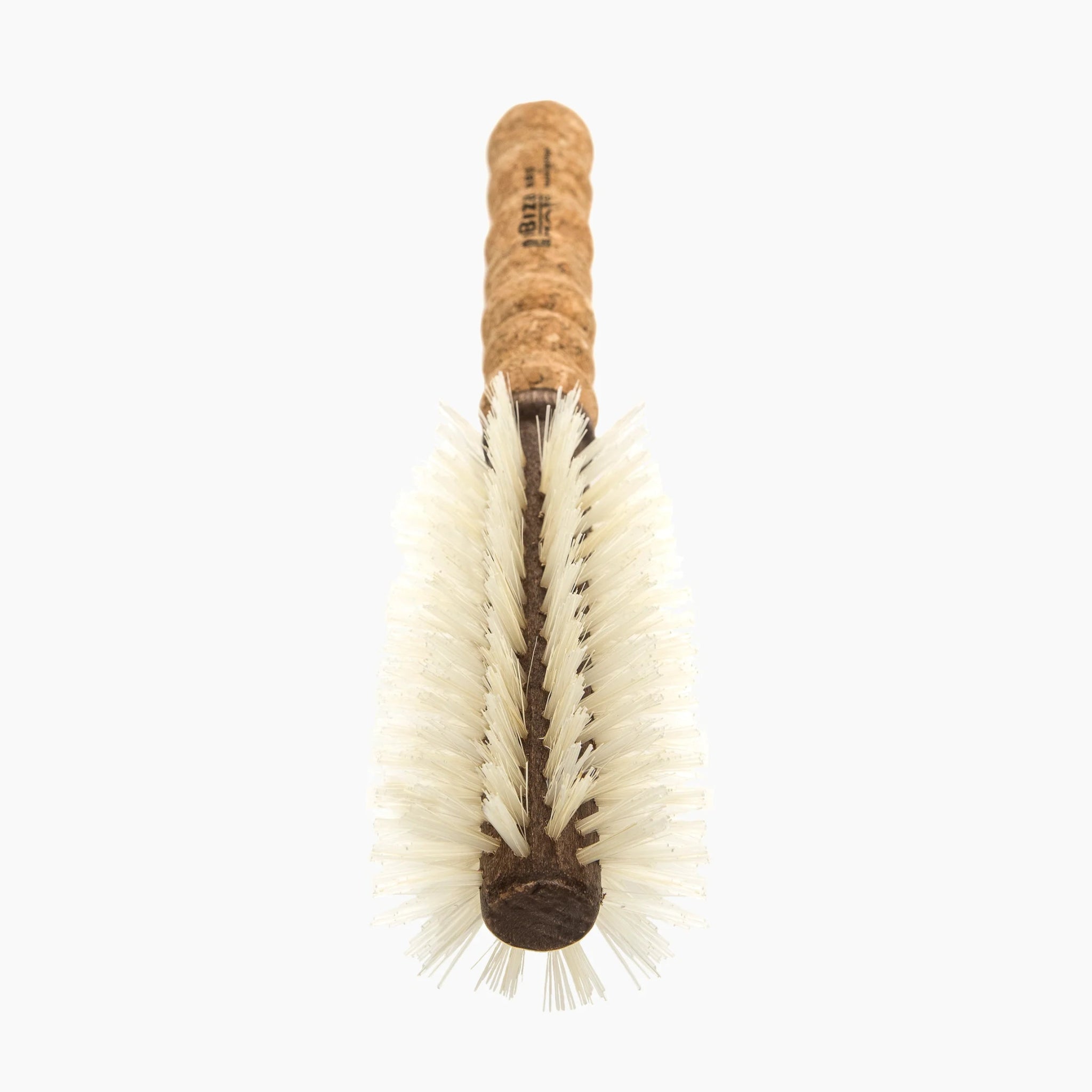Bottle brush with cork handle on a white background