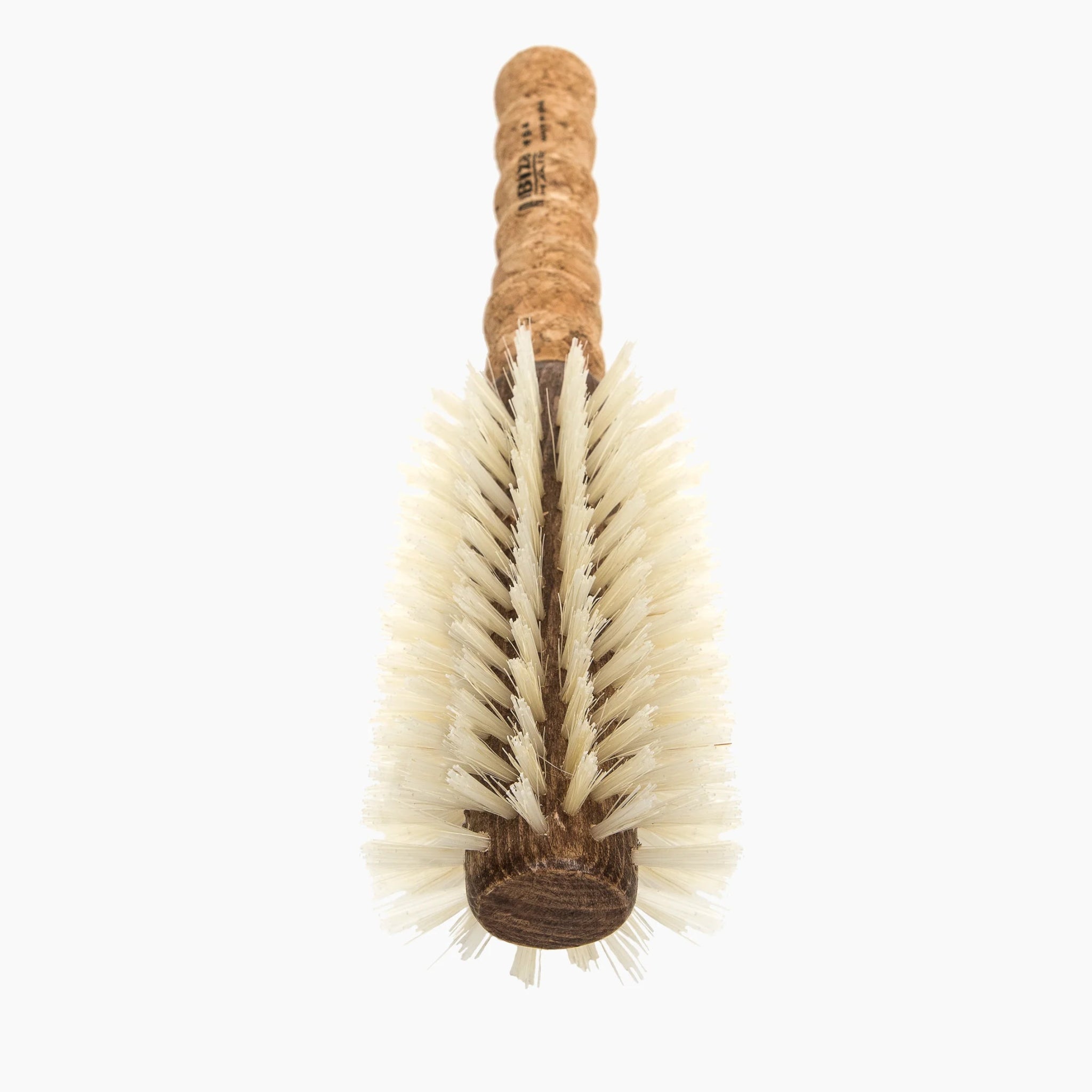 Round brush with cork handle on a white background