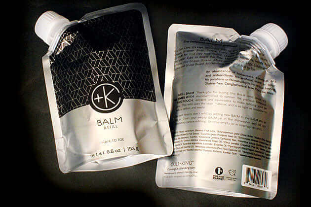 A package of Cult and King BALM | Hair to Toe sitting on a black surface for skin and hair care.