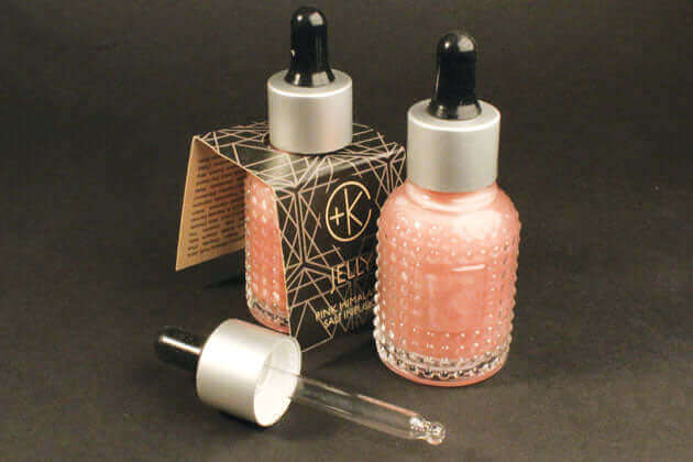 A bottle of Cult and King JELLY with a box next to it, highlighting its moisture and volume.