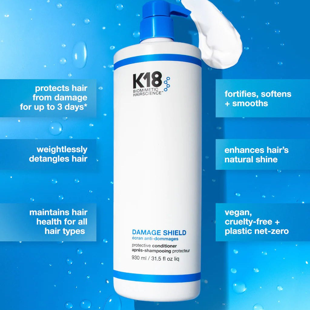 A bottle of K18 Damage Shield pH Protective Conditioner by K18 Hair Repair product against a blue background with text highlighting features like hair damage protection, being a nourishing conditioner that is vegan and cruelty-free, and benefits for detangling and enhancing natural shine.
