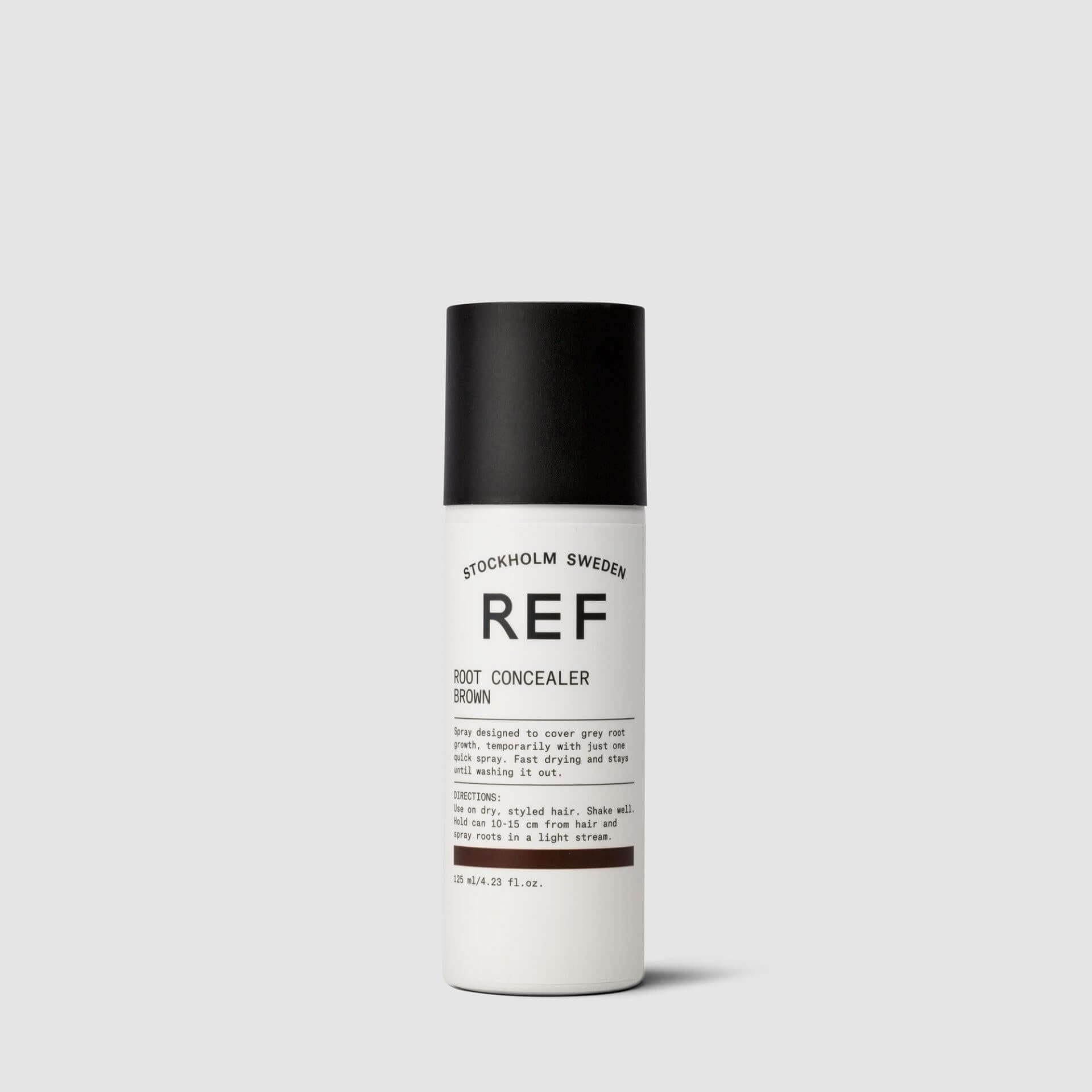 A bottle of REF STOCKHOLM SWEDEN Root Concealer for grey roots.